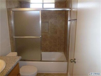 BOTH REMODELED BATHS FEATURE NEW CUSTOM TILED SHOW