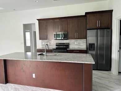 3882 SW Ridley St, Port St. Lucie, FL 34953 - photo 2