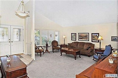 Double door entry with formal living room.