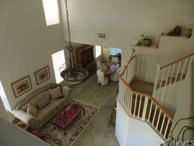 Towering cathedral ceilings bring elegance and ope