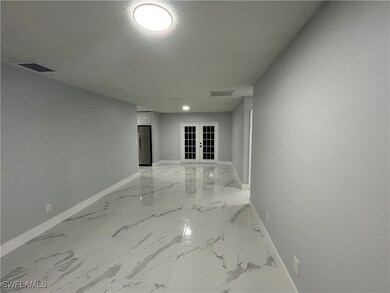 Hall featuring french doors