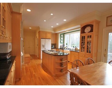 Kitchen. Eat-in dining area to the right with glas