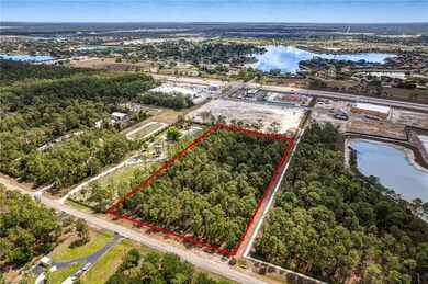 Aerial view of property and surrounding area featu