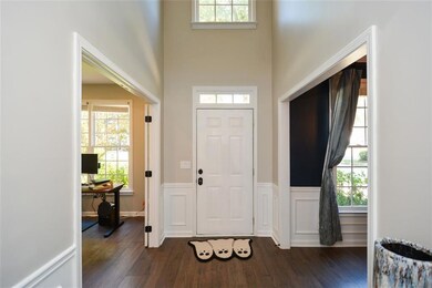 Two-story entrance opens to all new LVP flooring and all new light fixtures