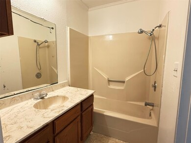 Bathroom with bathing tub / shower combination an