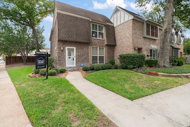 Charming corner lot with lush landscaping and invi