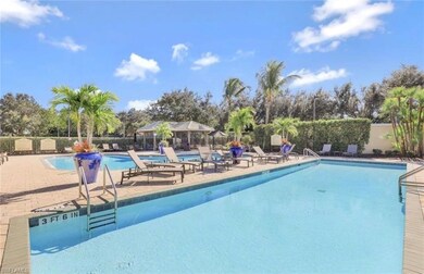Pool with a patio area, fence, and a gazebo