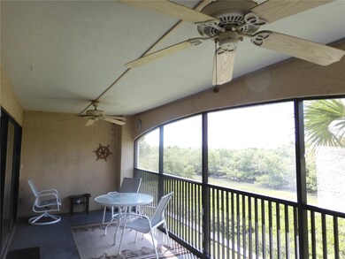 Spacious screened balcony w/storage closet