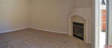 family room with another gas fireplace