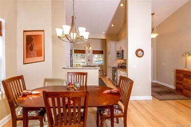 Open floor plan, hardwood floors and tasteful fixt