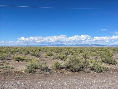 View to west San Juan Mountains across 59 rd