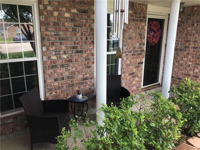 Enjoy the front porch views and beautiful tree sha