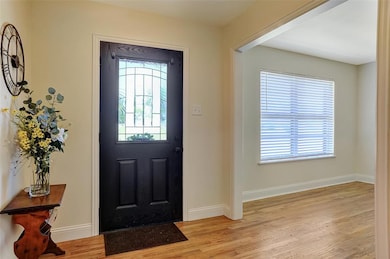 Interior entry.  Dining room to the left or straight through to the living room.