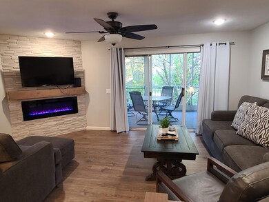 LIV ROOM/ WALK OUT SCREENED DECK
