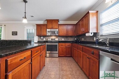 Stainless steel appliances and granite countertips