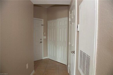 ENTRANCE HALL (LAUNDRY AND COAT CLOSET OFF THIS...