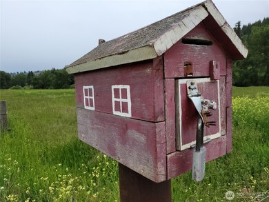 The Little Red Barn box where fisherman used to deposit $10 to launch their boat on our property!