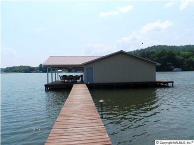 2 Slip Boathouse, with good water, and a 30x8 Covered Deck