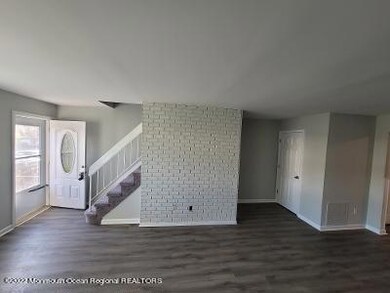 78 primrose brick wall living room