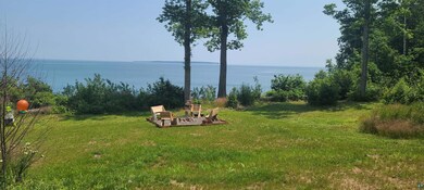View of yard with a water view