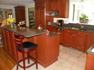 Kitchen. An island provides casual...