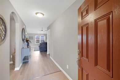 The tile entry leads to the main living area with