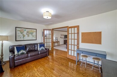 Solid wood floors at entry, hall, and study...
