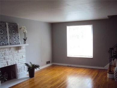 Lovely living room with hardwood floors.