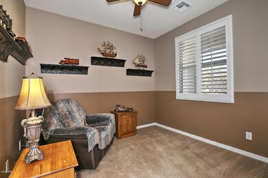 6805 W Mockingbird Way-large-004-005-Den