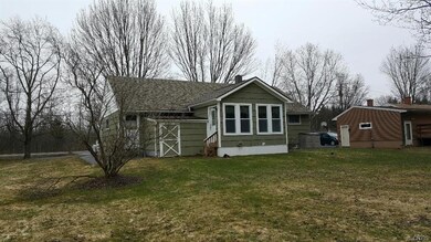 4 season sunroom overlooks large backyard, great f