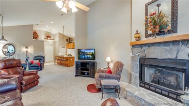 Open concept living, dining and kitchen.