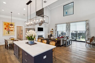 Island kitchen with quartz countertops and built-i