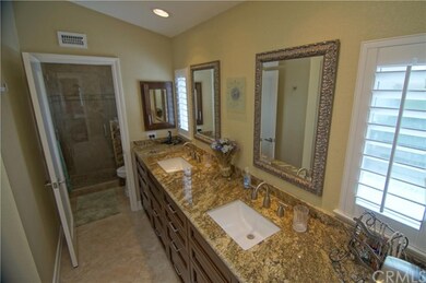Remodeled master bath with granite counters