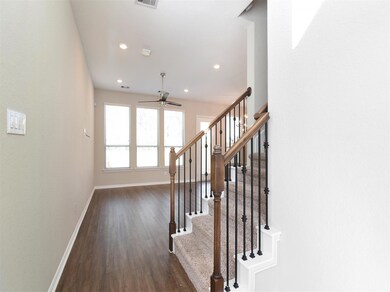 Foyer leading to open floor plan. Better than new