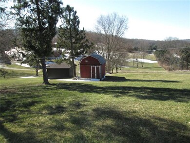 Shed on the right goes with the property.