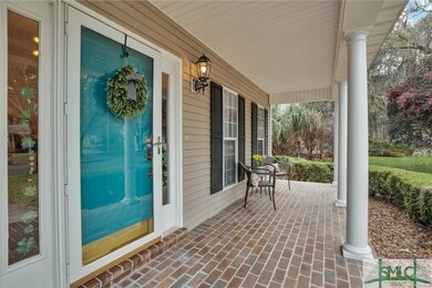 Inviting front porch perfect for relaxing.