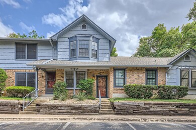 View of front of property featuring brick siding,
