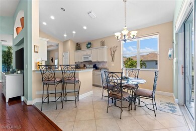 Dining area featuring visible vents, baseboards, a chandelier, light tile patterned floors, and recessed lighting
