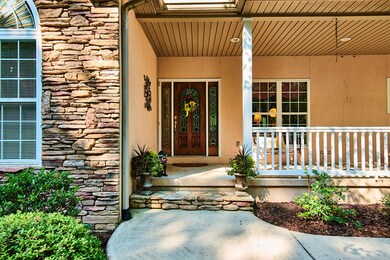 Note the stone wall and steps