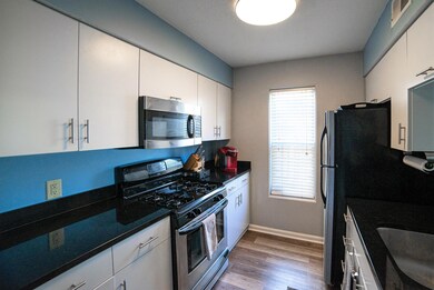 White cabinets/Solid Surface tops
