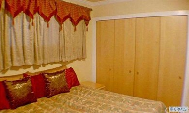 Custom closets in master bedroom.