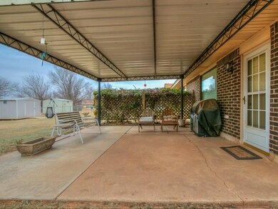 Relax on the large covered patio out back. There i