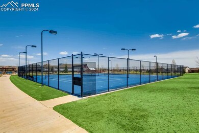 View of community tennis court