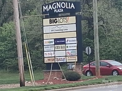 across  the street   from Maganolia  Place place