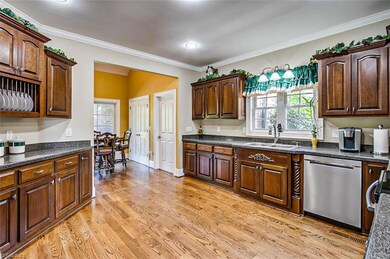 Kitchen with hardwoods &  beautiful cherry cabinets