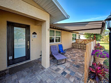COZY PAVER PATIO WITH AWNING OPEN