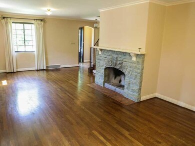 Living Room. COVERED ENTRY WITH CLOSET ACROSS FROM