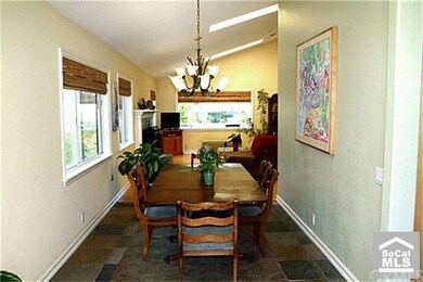 Formal dining room with slate floors