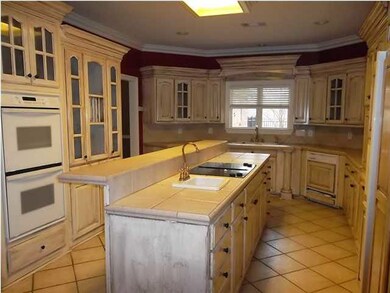 Kitchen-double ovens, cooktop and fridge