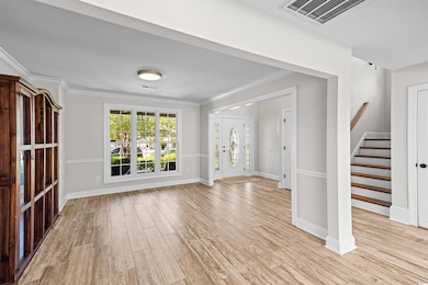 Foyer entrance with vier of dining room/flex area.
